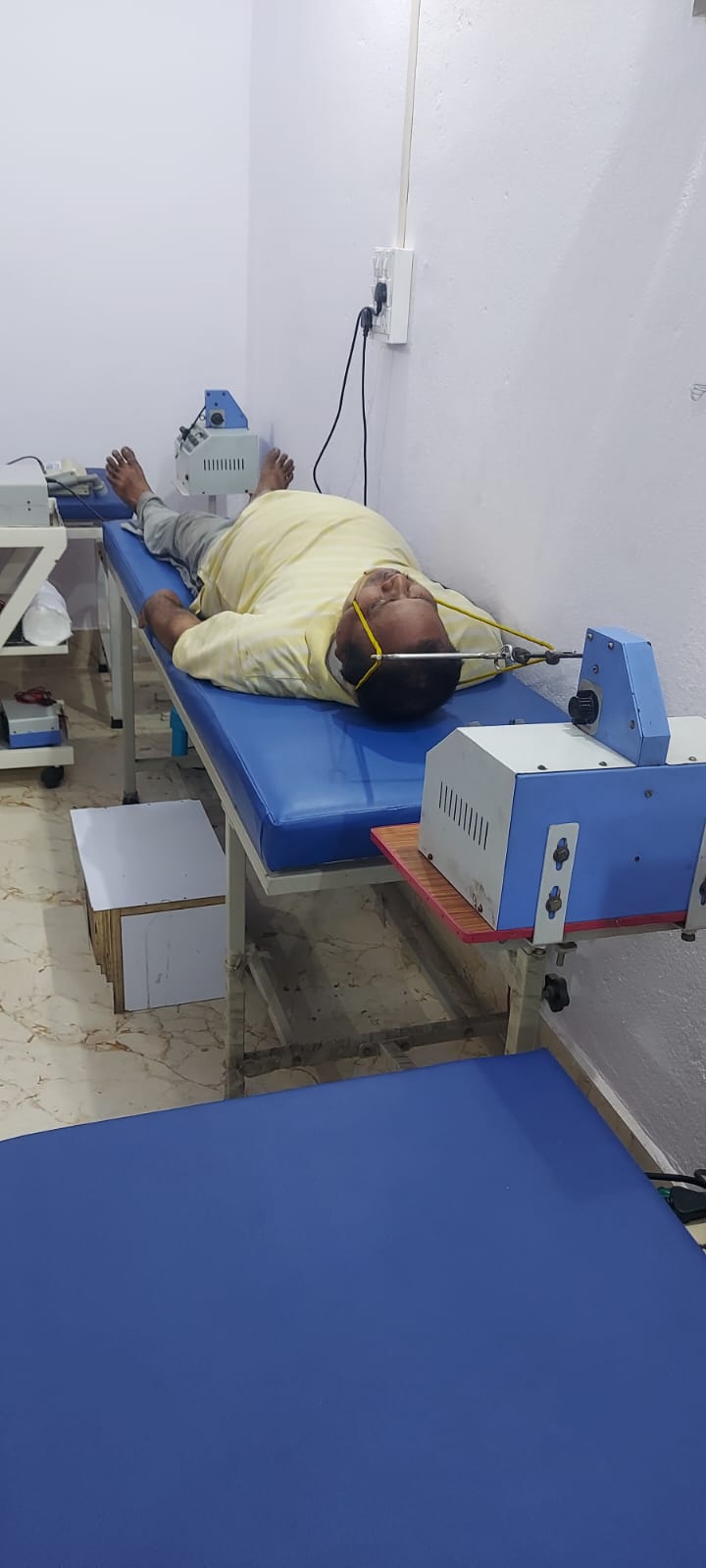 Physiotherapist assessing a patient's knee